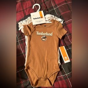 Timberland 4 pack baby bodysuits